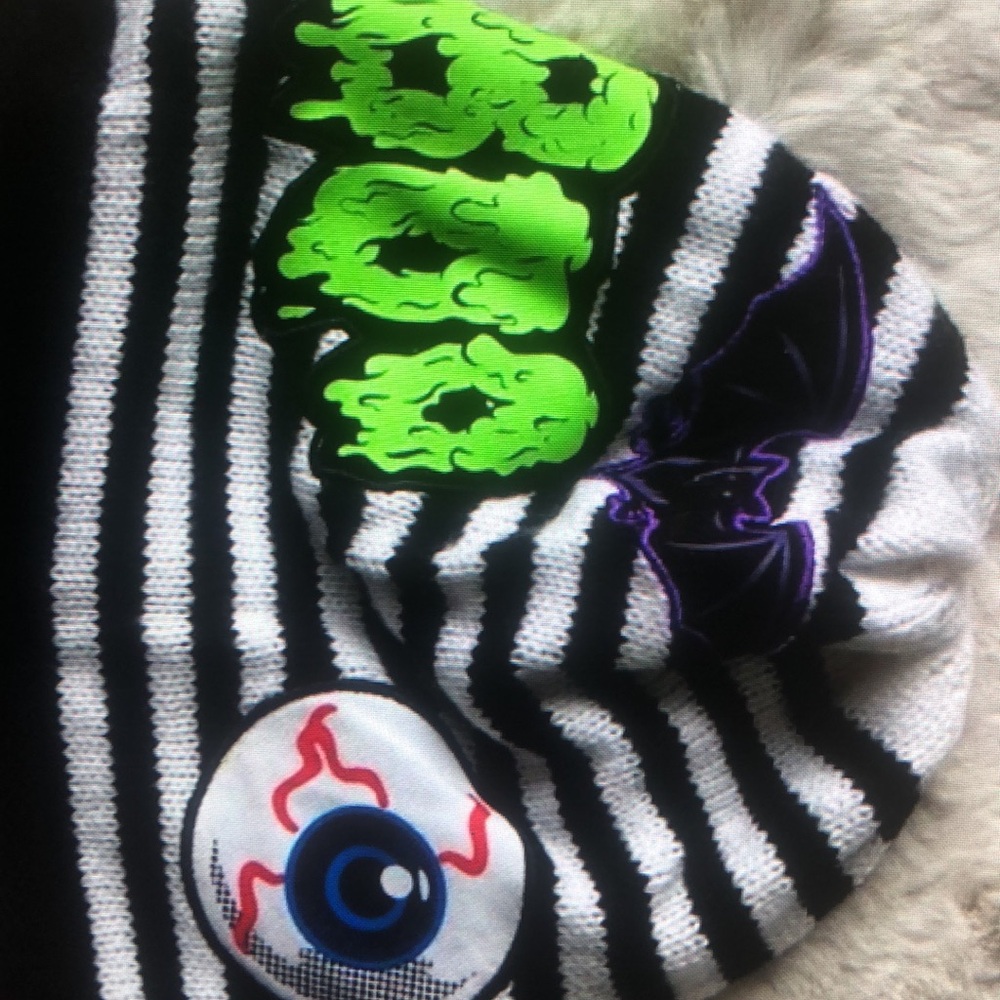 Striped beanie winter layer Halloween vibes spooky